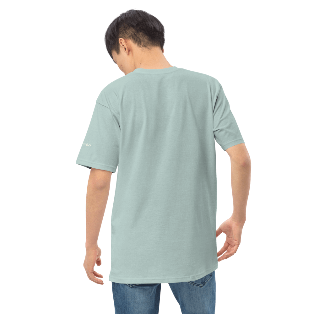Back view of a man wearing a premium selfmade essential tee in soft organic cotton, showcasing a relaxed fit.