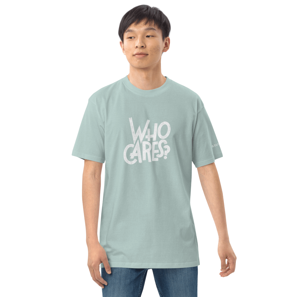 Trendy graphic tee in light blue with 'WHO CARES?' printed design, made from soft organic cotton.