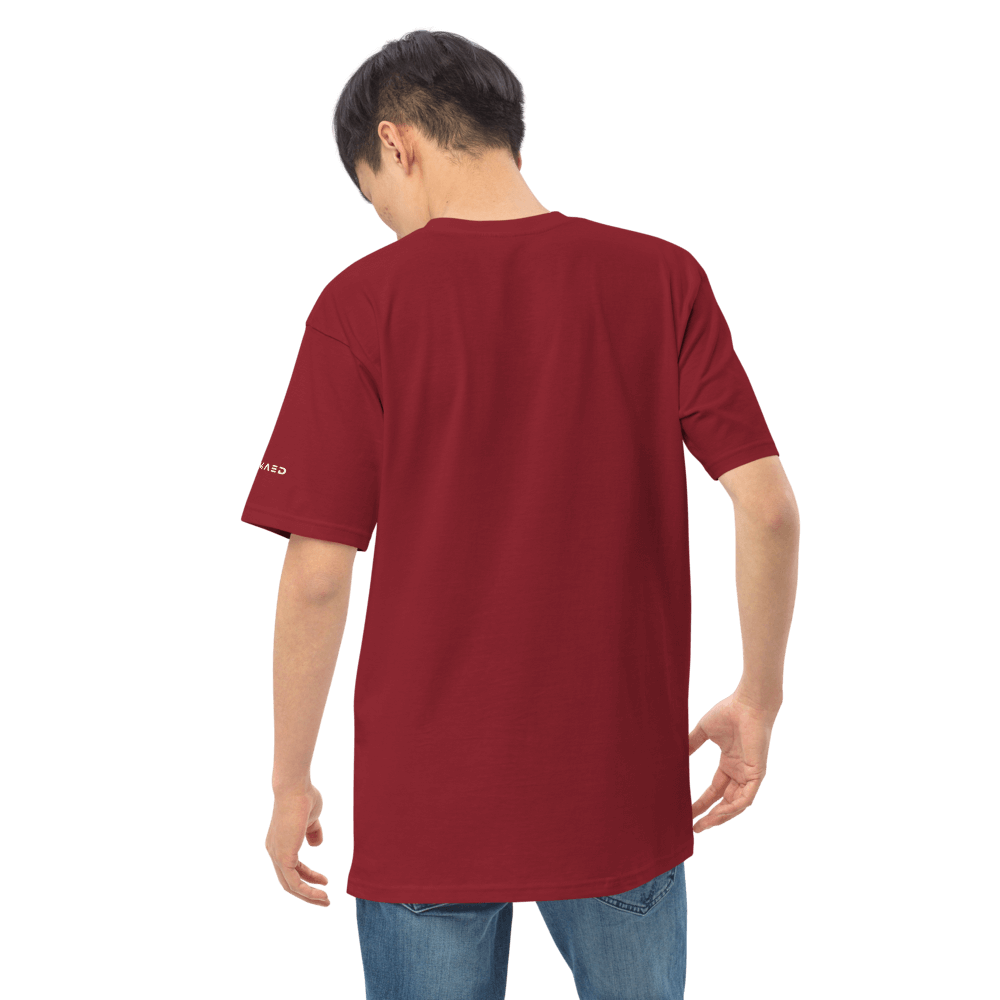 Back view of a man wearing a maroon premium heavyweight graphic tee made from organic cotton.