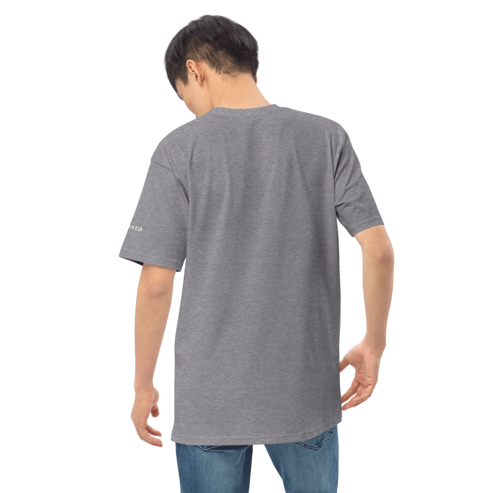 Back view of a model wearing the Essential Strong Tee in gray, highlighting its sturdy silhouette and comfortable fit.