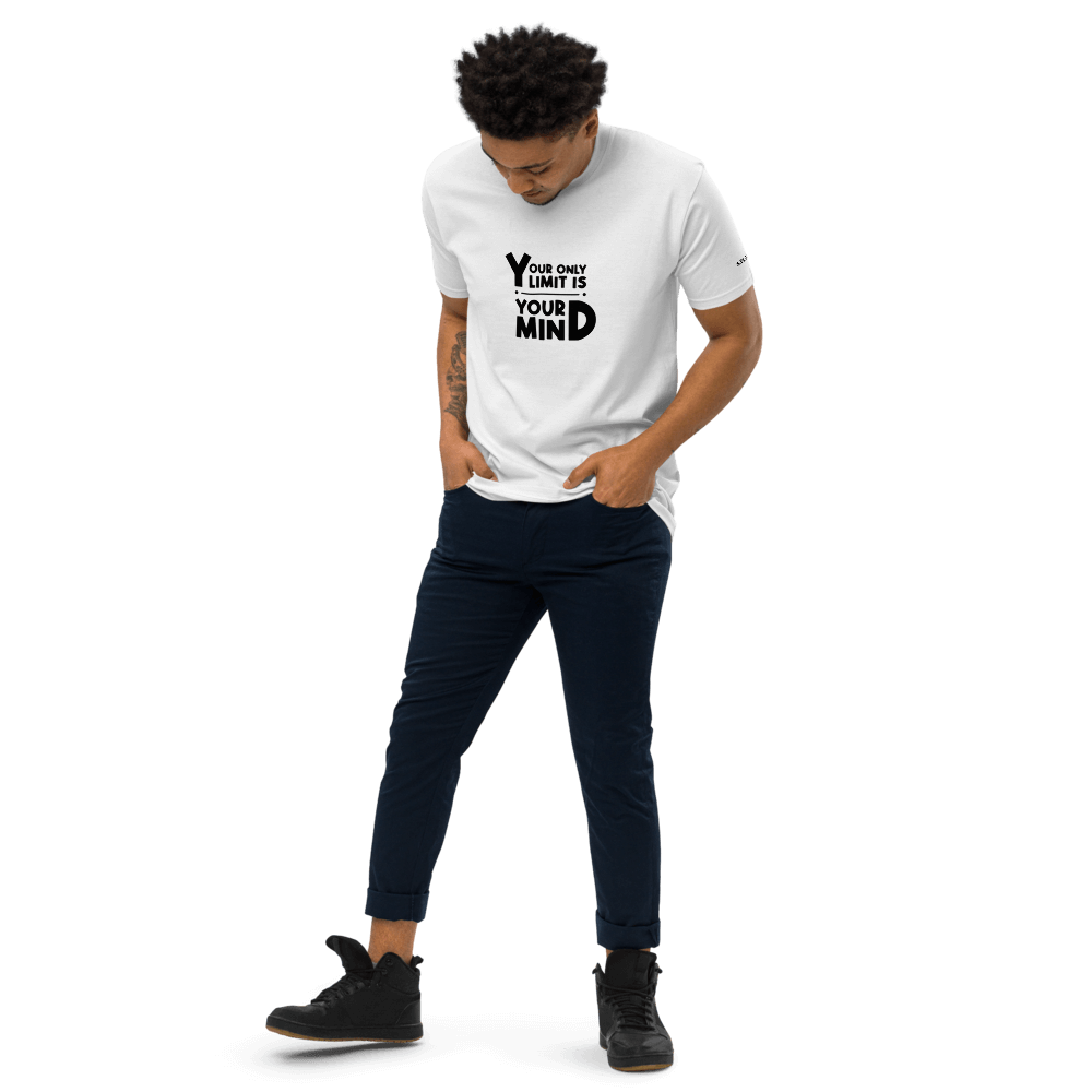 Man wearing a motivational white tee shirt with the message 'Your only limit is your mind', showcasing a casual look.
