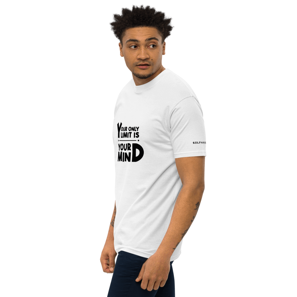 Model wearing an essential white tee with motivational quote 'Your only limit is your mind' in stylish print.