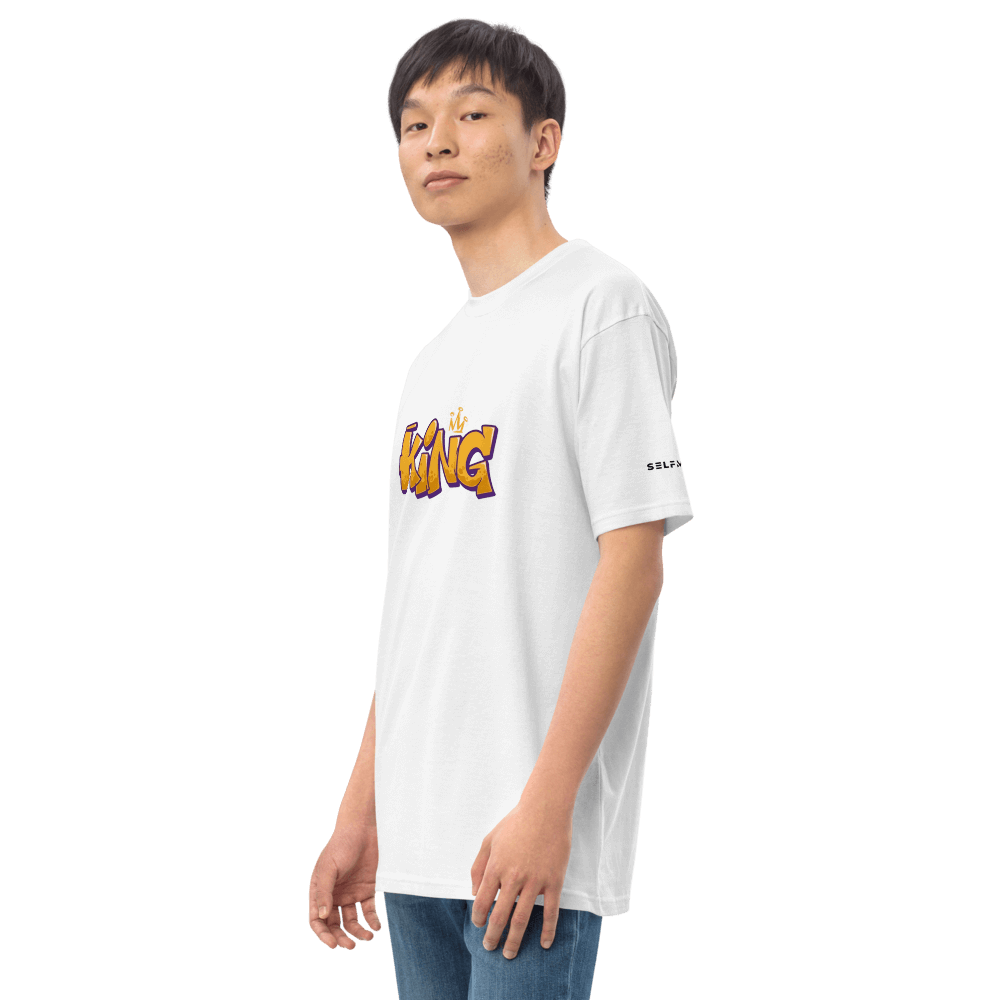 Model showcasing Essential White King T-shirt, a premium organic cotton tee featuring a bold graphic style.