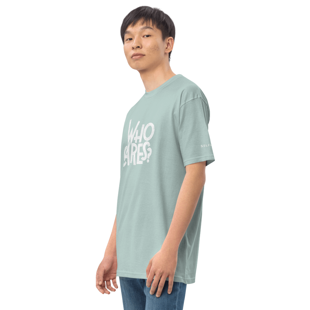 Model wearing a trendy organic cotton tee with graphic 'WHO CARES?' design, showcasing a stylish fit and comfort.