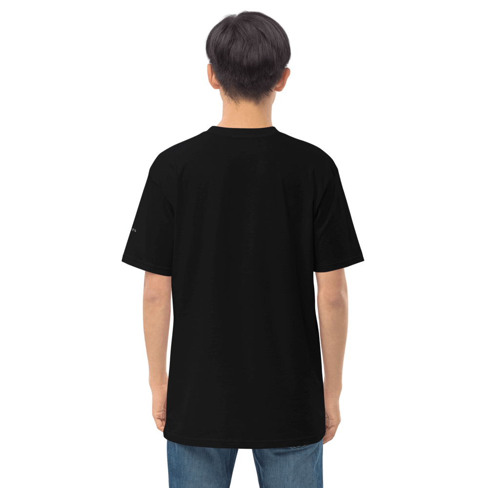 Model wearing the back view of a black premium tee made from organic cotton, showcasing a tailored fit.