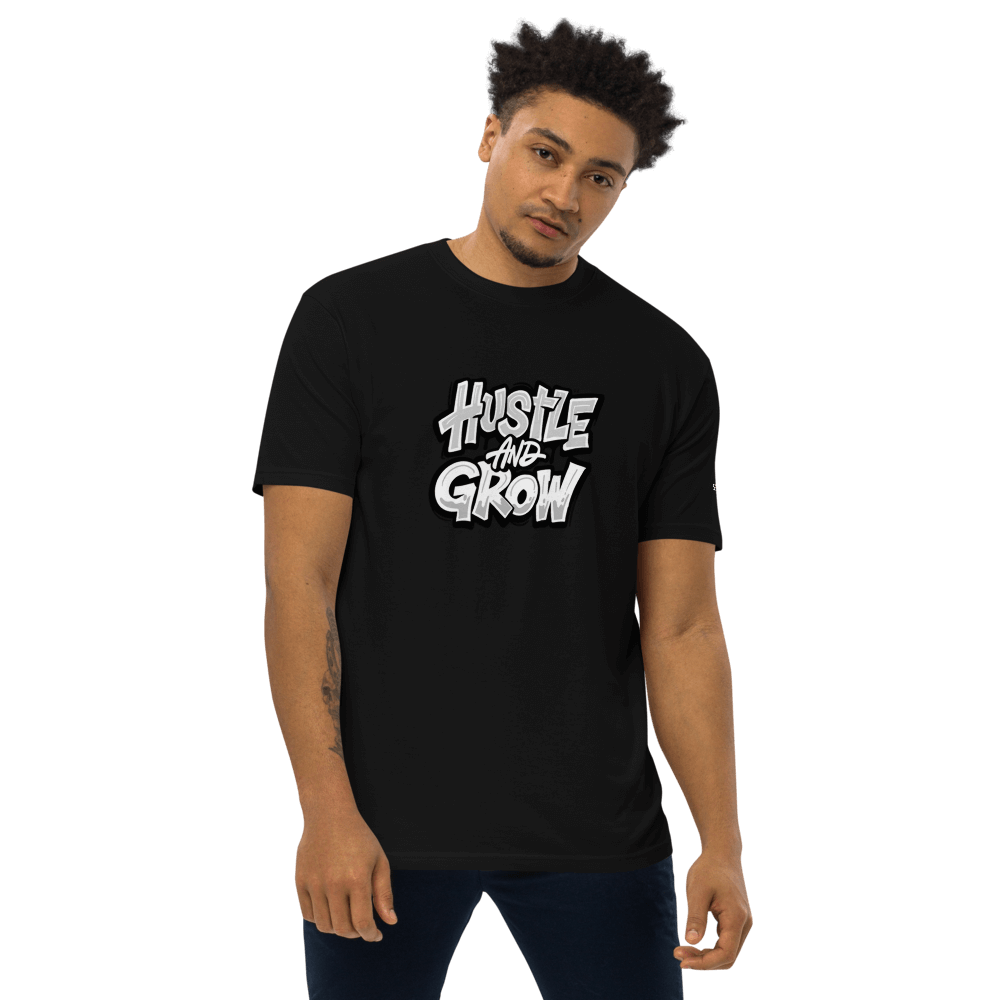 Model wearing Hustler's Tee in black, showcasing a stylish design made of soft organic cotton.