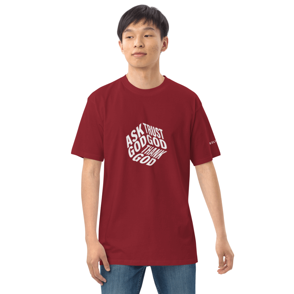 Model wearing a bold maroon graphic tee featuring motivational text, made from premium organic cotton for comfort.