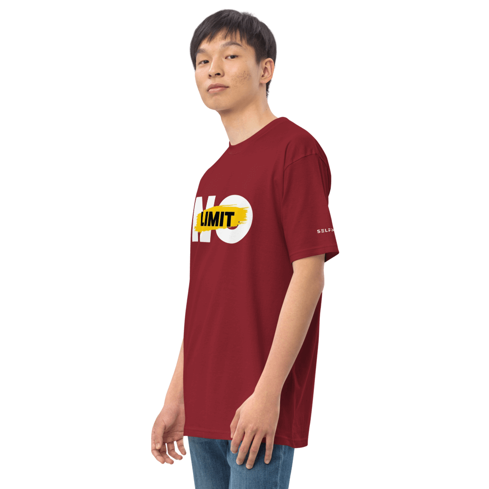 Model wearing essential maroon tee, featuring bold 'NO LIMIT' design, made from soft premium organic cotton.