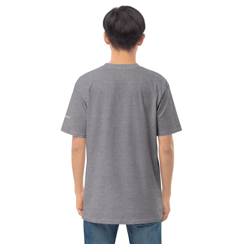 Back view of a man wearing a self-made essential tee in gray, showcasing its relaxed fit and premium cotton fabric.