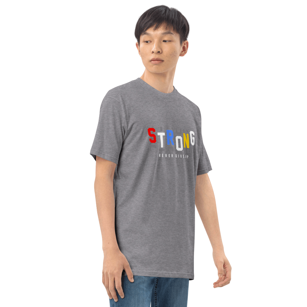 Model wearing Essential Strong Tee, a sturdy and comfortable t-shirt made from ring-spun cotton, showcasing colorful lettering.
