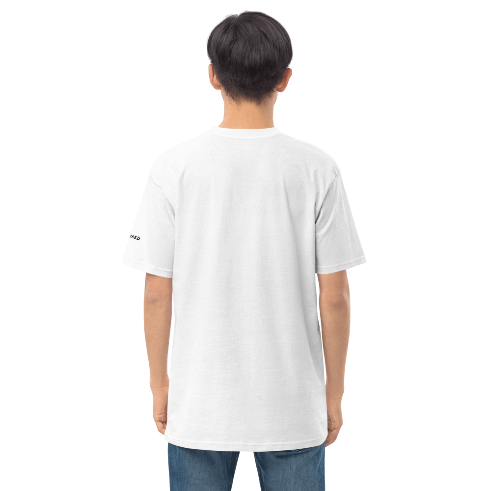 Back view of a man wearing a Selfmaed Premium Tee in white, showcasing its comfortable fit and quality fabric.