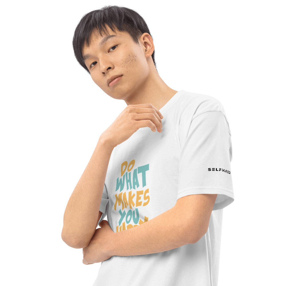 Model wearing a white premium tee with motivational text, showcasing organic cotton apparel and stylish fit.