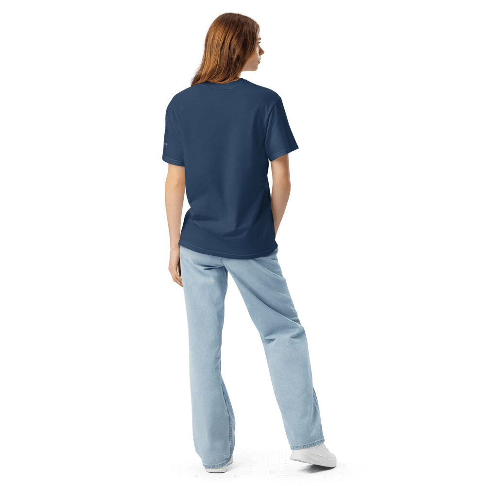 Model wearing a navy Essential Positive Energy Tee, showcasing its relaxed fit and comfort from behind.