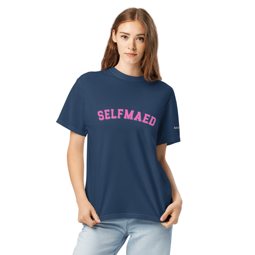 Model showcasing a navy Selfmaed tee, highlighting premium organic cotton comfort and unisex style.